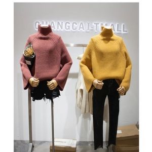 Orange turtleneck sweater